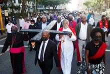 Clergymen carry a large cross during a Good Friday procession in Durban, South Africa, April 15. (CNS/Reuters/Rogan Ward)